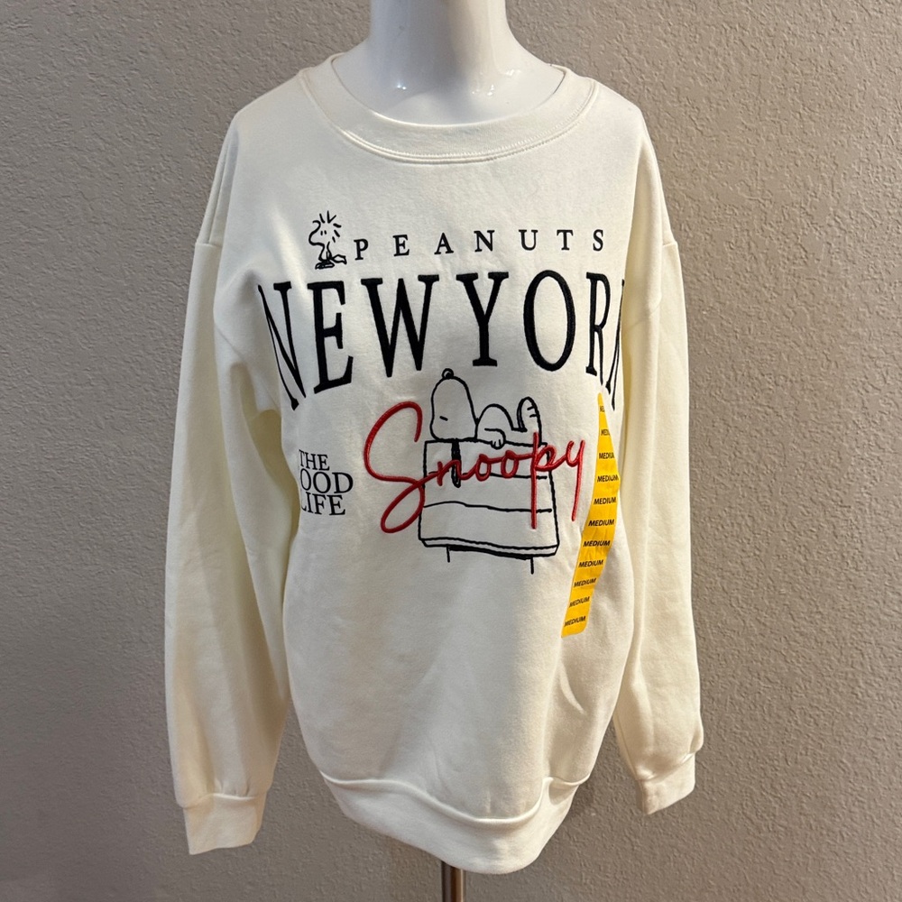 Peanuts Cream Crewneck Sweater with Red Snoopy Script